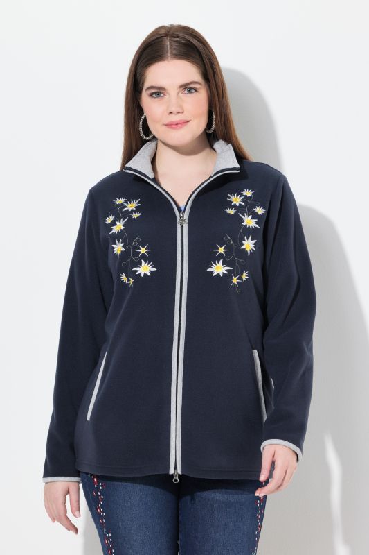 Veste en polaire esprit costume traditionnel bavarois. Fermeture zippée à double sens. Broderies edelweiss
