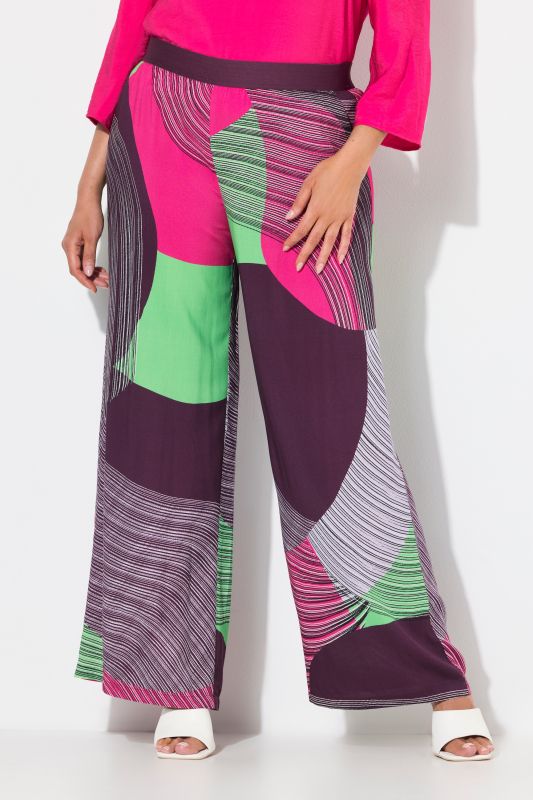 Pantalon imprimé. Jambe large et droite. Taille élastique