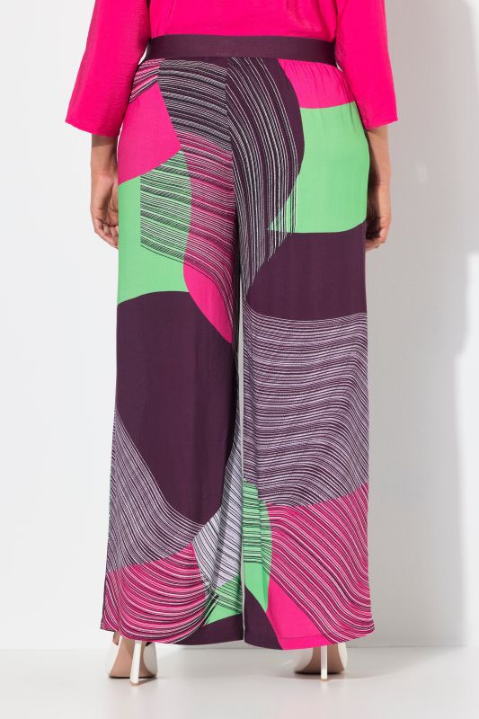 Pantalon imprimé. Jambe large et droite. Taille élastique