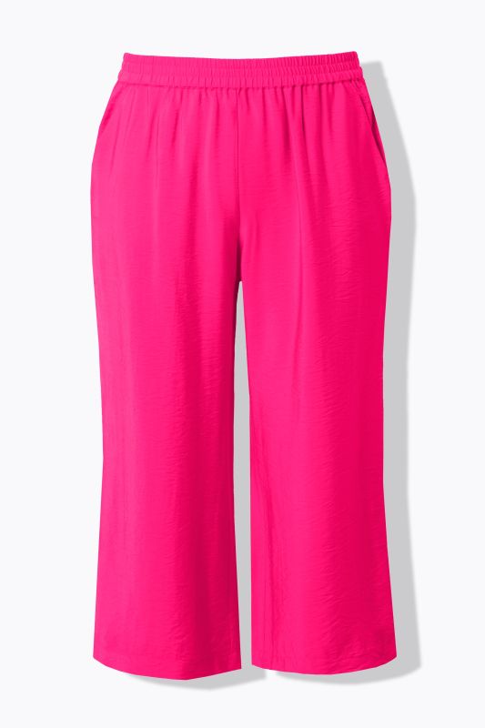 Jupe-culotte à jambe large et taille élastique. Tissu à texture irrégulière