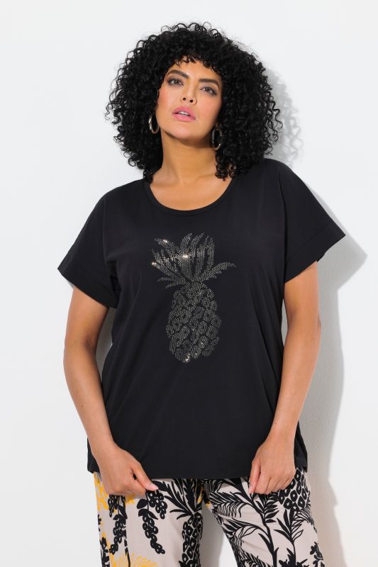 T-shirt oversize. Encolure ronde et manches courtes. Motif ananas à strass fantaisie