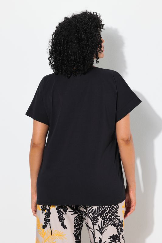 T-shirt oversize. Encolure ronde et manches courtes. Motif ananas à strass fantaisie