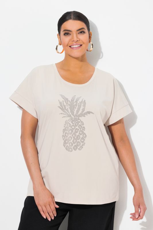 T-shirt oversize. Encolure ronde et manches courtes. Motif ananas à strass fantaisie