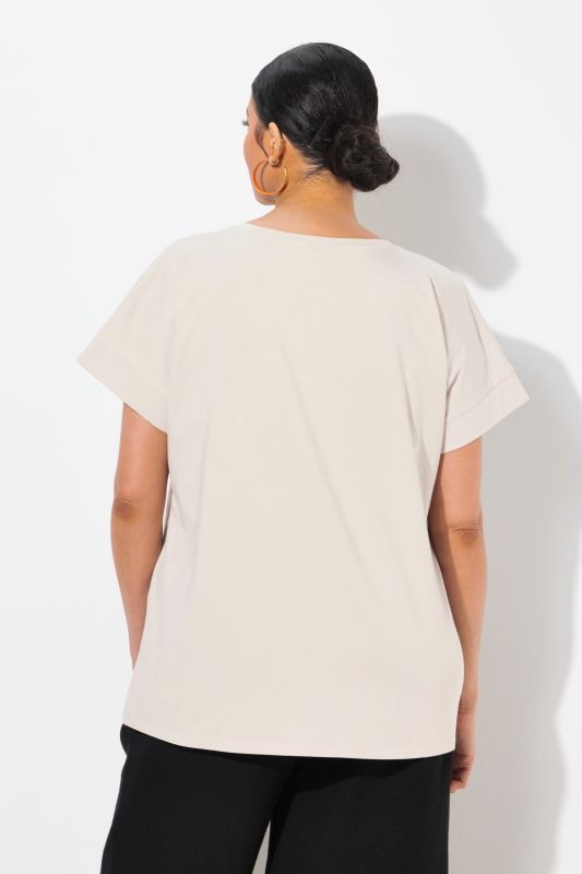 T-shirt oversize. Encolure ronde et manches courtes. Motif ananas à strass fantaisie