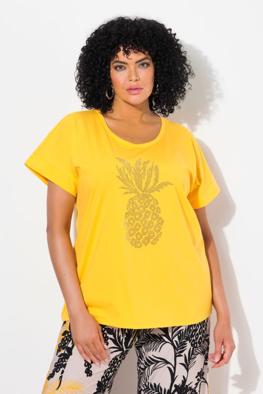 T-shirt oversize. Encolure ronde et manches courtes. Motif ananas à strass fantaisie