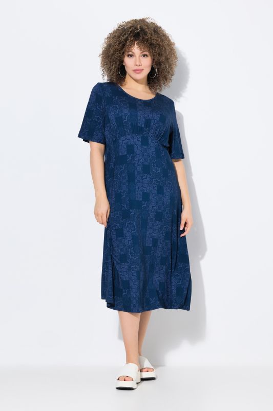 Robe en jersey coupe évasée, décolleté rond et manches courtes volantées