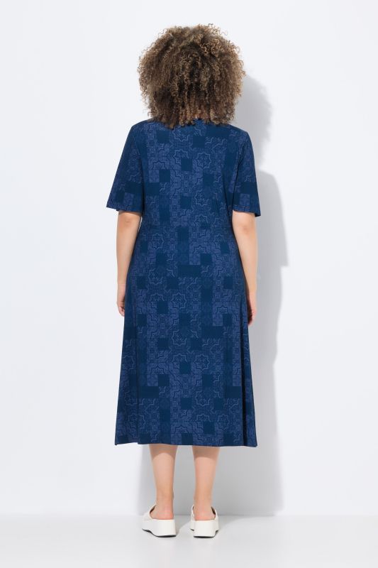 Robe en jersey coupe évasée, décolleté rond et manches courtes volantées