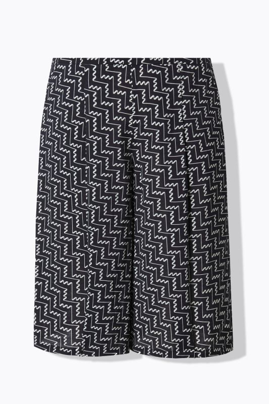 Jupe-culotte courte. Jambe large et taille confortable. Tissu à texture « martelée »