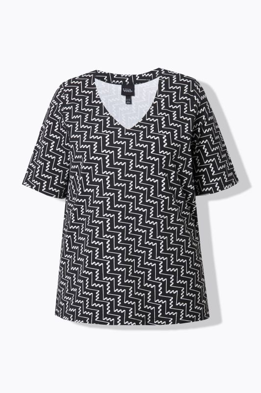 T-shirt à imprimé graphique. Col en V et manches courtes. Coupe évasée