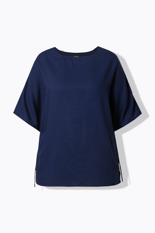 Blouse-tunique oversize. Col bateau et manches courtes