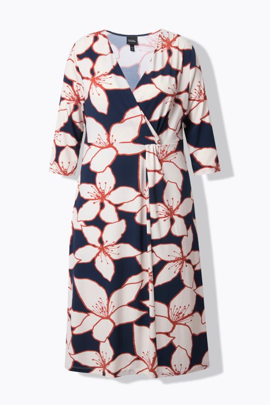 Robe midi à manches 3/4. Col en V effet cache-cœur. Motif floral