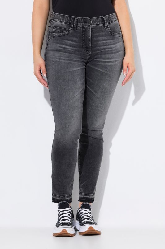 Jean Sarah à taille élastique, jambe étroite avec ourlet frangé