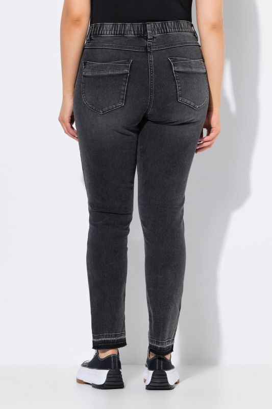 Jean Sarah à taille élastique, jambe étroite avec ourlet frangé