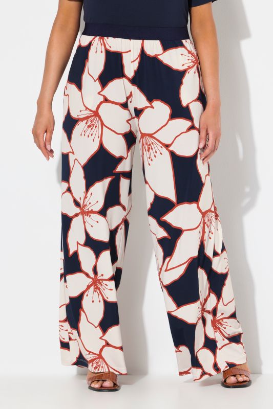 Pantalon en jersey à motif floral. Jambe droite et large. Taille élastique