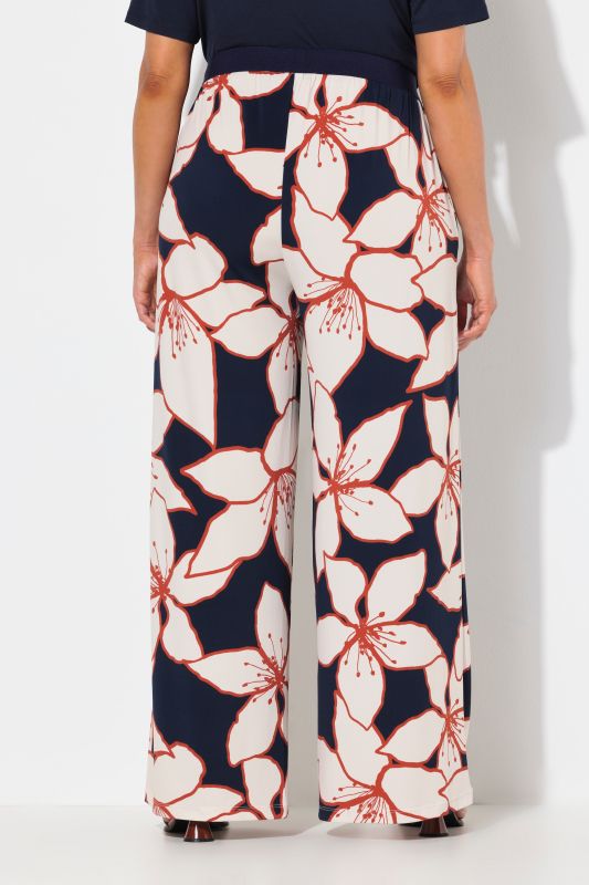 Pantalon en jersey à motif floral. Jambe droite et large. Taille élastique