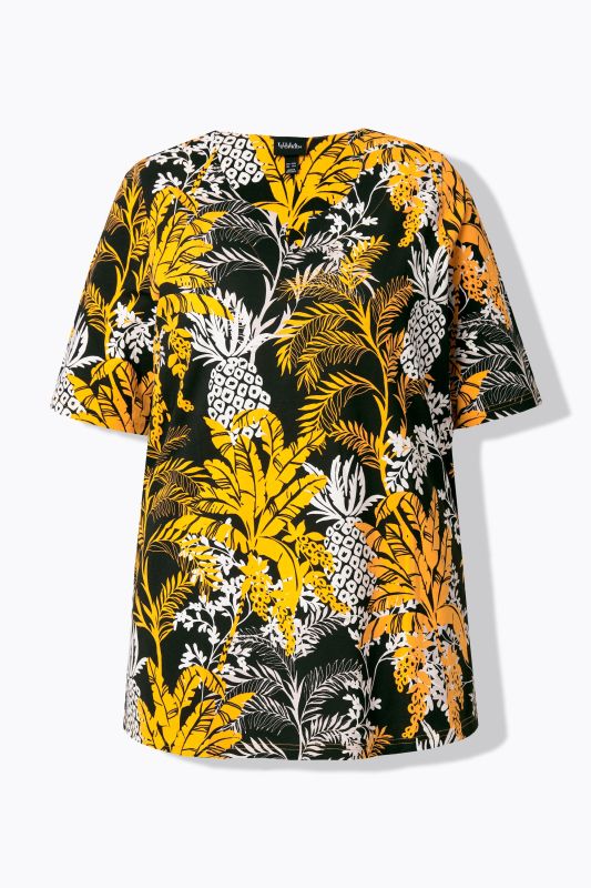 T-shirt à motif palmiers. Manches courtes et col tunisien. Coupe évasée