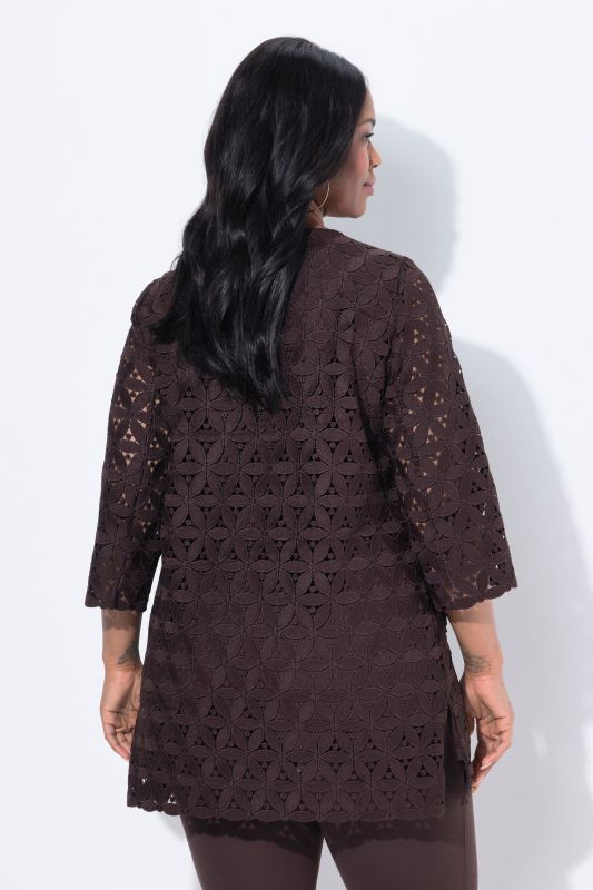 Tunique avec broderies ajourées, décolleté en V et manches 3/4, coupe évasée