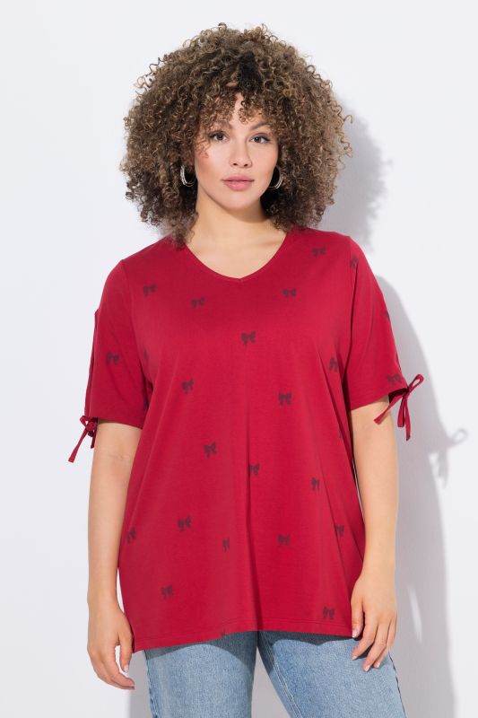 T-shirt coupe évasée, motif petits nœuds, décolleté en V et manches courtes
