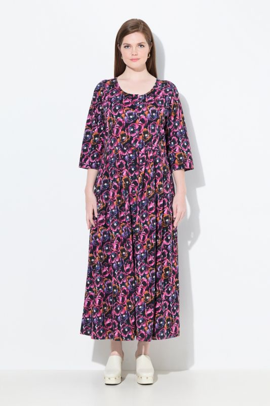 Robe maxi en jersey avec poches, décolleté rond et manches 3/4, coupe évasée