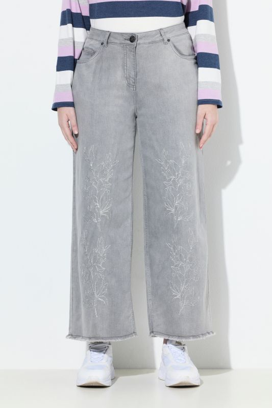 Jean Marie en denim stretch, broderie et bas de jambe avec ourlet frangé