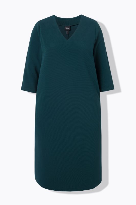 Robe en jersey avec poches, décolleté en V et manches 3/4