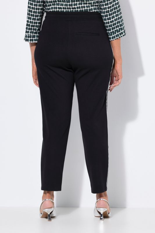 Pantalon point de Rome, jambe carotte et taille élastique, galon le long de la jambe