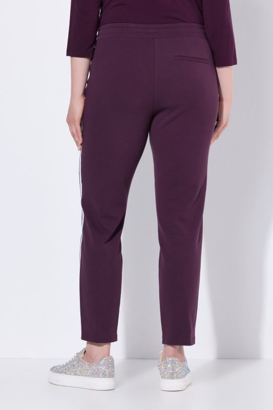 Pantalon point de Rome, jambe carotte et taille élastique, galon le long de la jambe