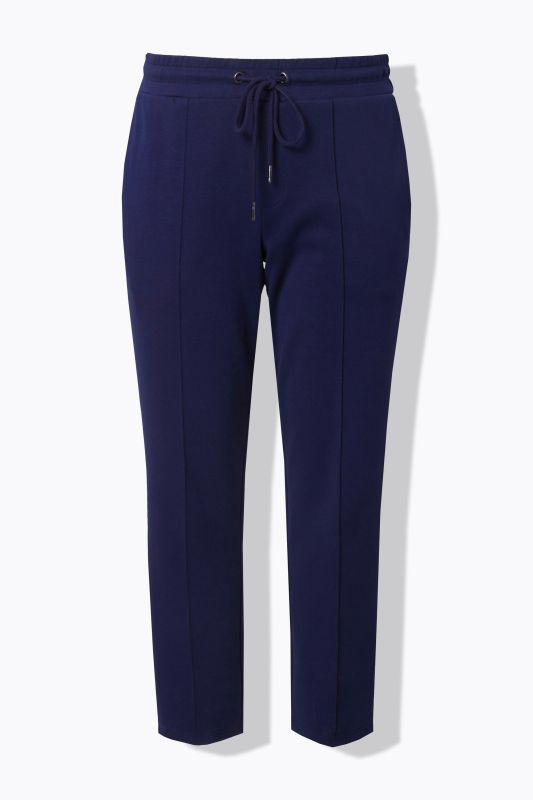 Pantalon point de Rome, jambe carotte et taille élastique, galon le long de la jambe