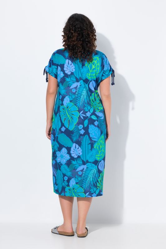 Robe midi en jersey. Col en V et cordons à froncer. Motif floral et coupe évasée