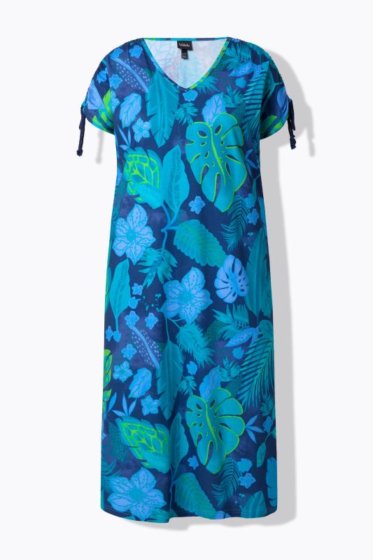 Robe midi en jersey. Col en V et cordons à froncer. Motif floral et coupe évasée