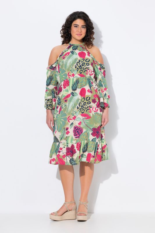 Robe à col rond et manches 3/4. Épaules nues et coupe évasée