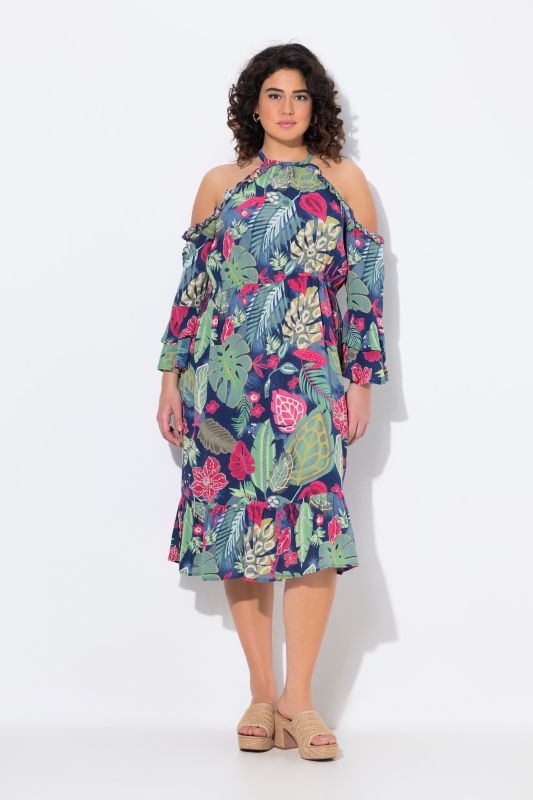 Robe à col rond et manches 3/4. Épaules nues et coupe évasée