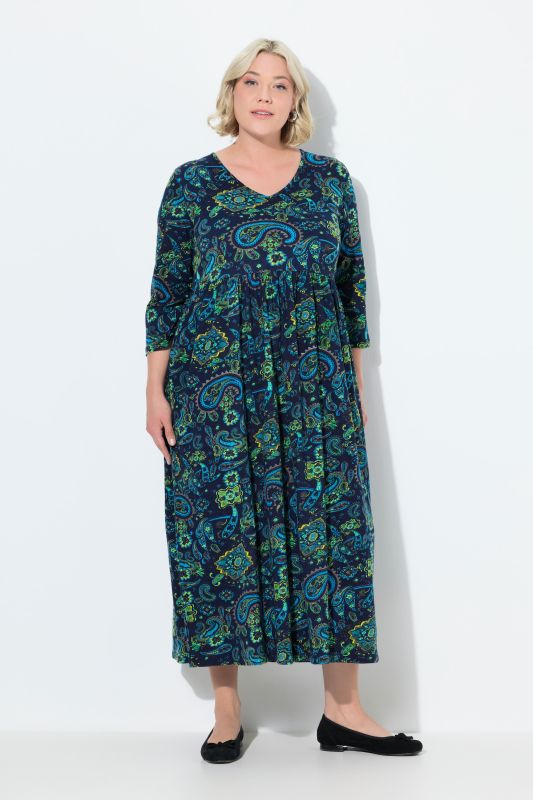 Robe en jersey, motif cachemire. Col en V et manches 3/4. Coupe évasée