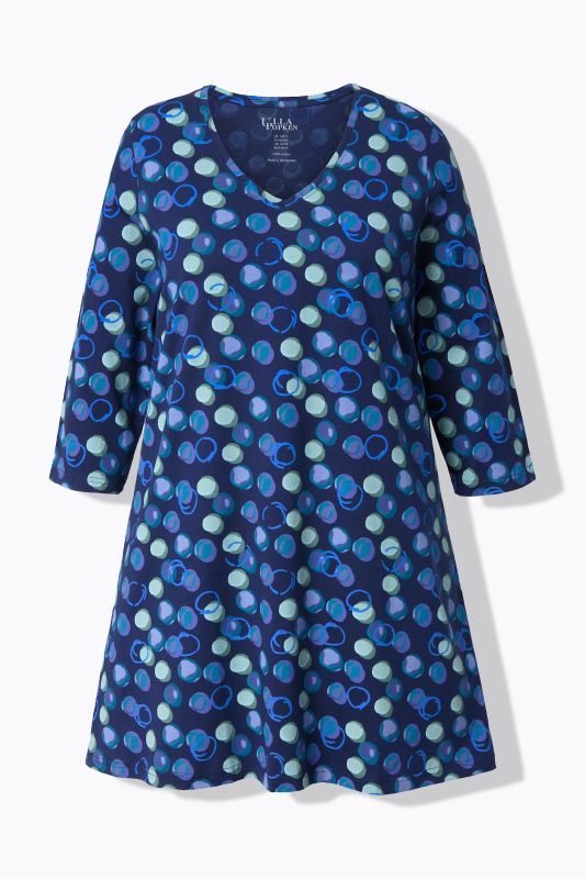 T-shirt long, motif à pois. Col en V et manches 3/4. Coupe évasée