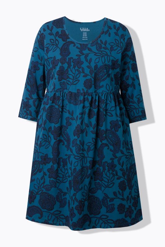 Robe en jersey, motif cachemire. Col rond et manches 3/4. Coupe évasée