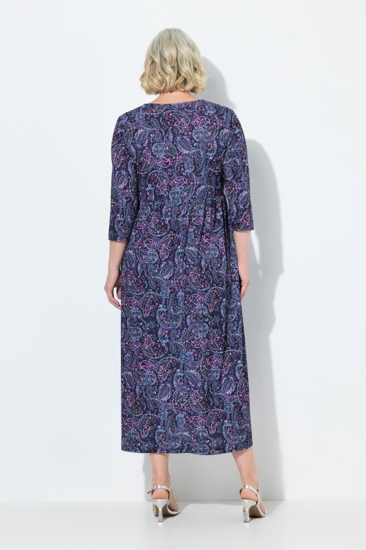 Robe en jersey, coupe évasée. Col en V et manches 3/4