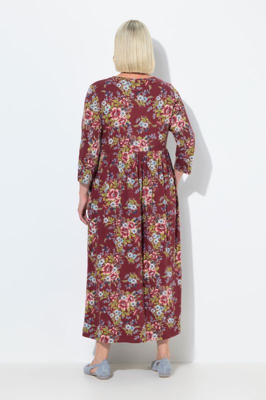 Robe maxi en jersey motif floral, col tunisien et manches 3/4, coupe évasée