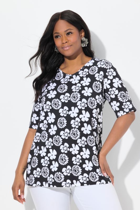 T-shirt à fleurs, coupe évasée. Encolure V et manches courtes
