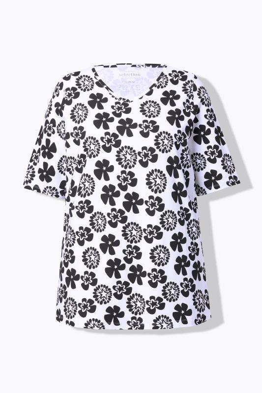 T-shirt à fleurs, coupe évasée. Encolure V et manches courtes