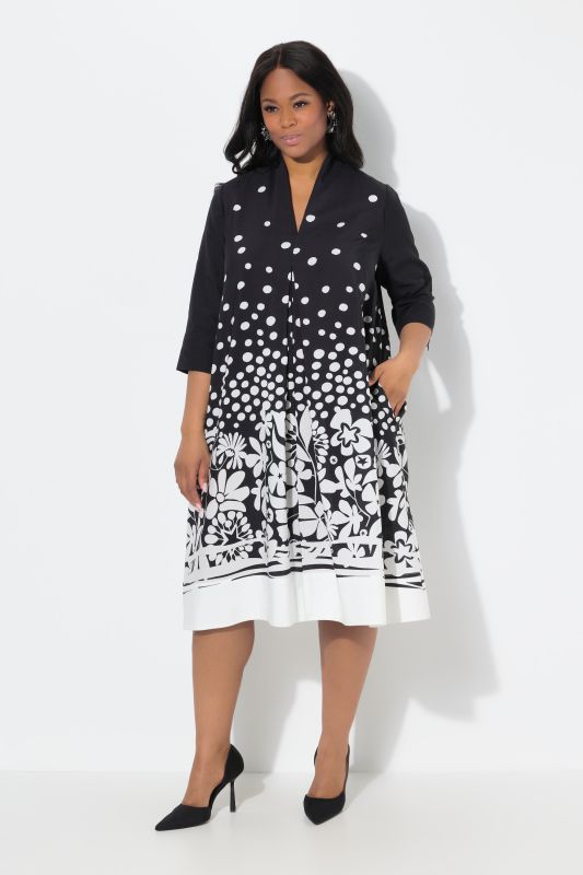 Robe midi en lyocell, coupe évasée. Col calice et manches 3/4