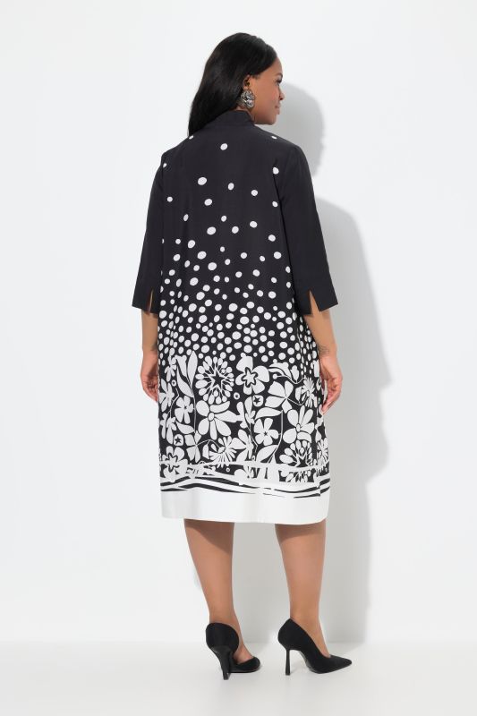 Robe midi en lyocell, coupe évasée. Col calice et manches 3/4
