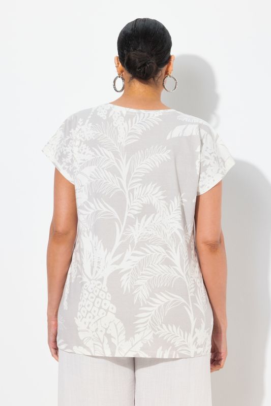 T-shirt oversize, motif palmiers. Encolure ronde et manches courtes
