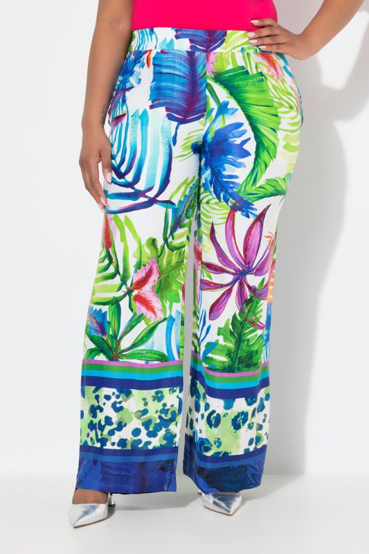 Pantalon en satin à taille élastique. Jambe droite et large. Imprimé feuilles
