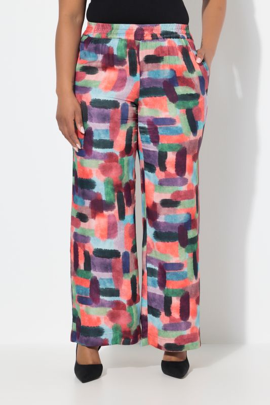 Pantalon en satin imprimé. Taille élastique et jambe large
