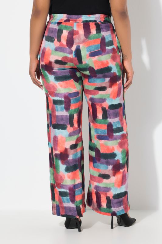 Pantalon en satin imprimé. Taille élastique et jambe large