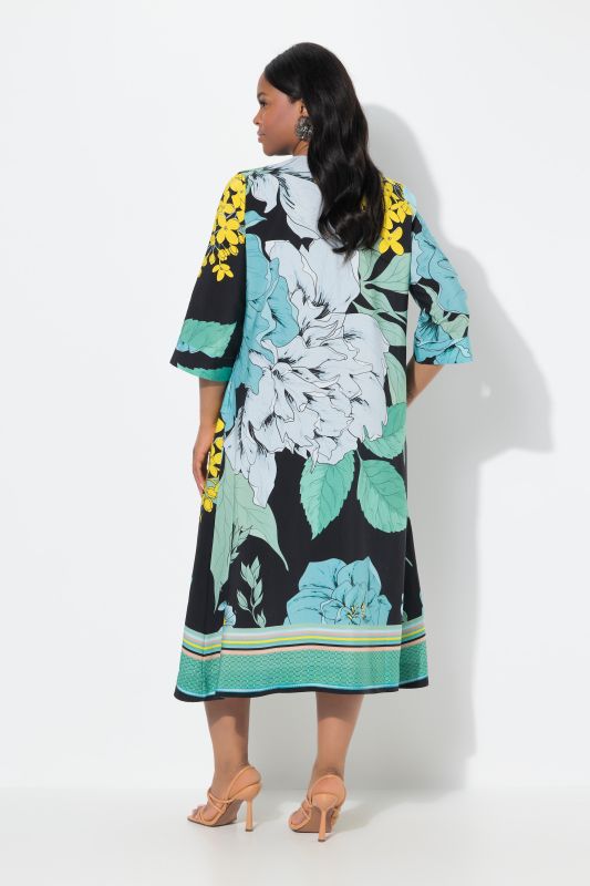 Robe midi en lyocell. Col en V et manches 3/4. Imprimé grandes fleurs. Coupe évasée