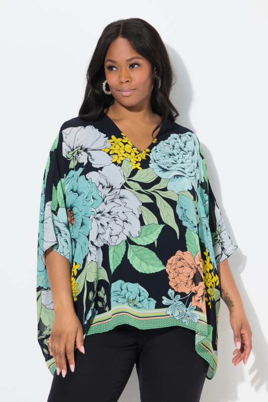 Blouse oversize en mousseline à fleurs. Encolure V et manches courtes