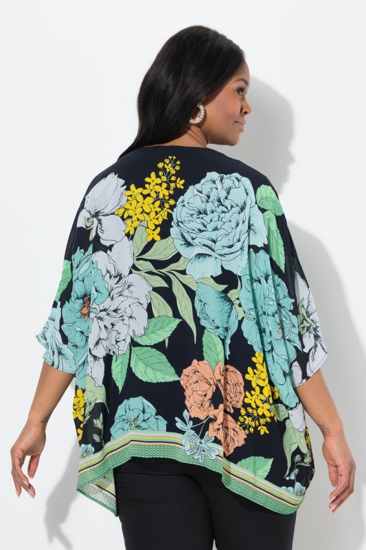 Blouse oversize en mousseline à fleurs. Encolure V et manches courtes