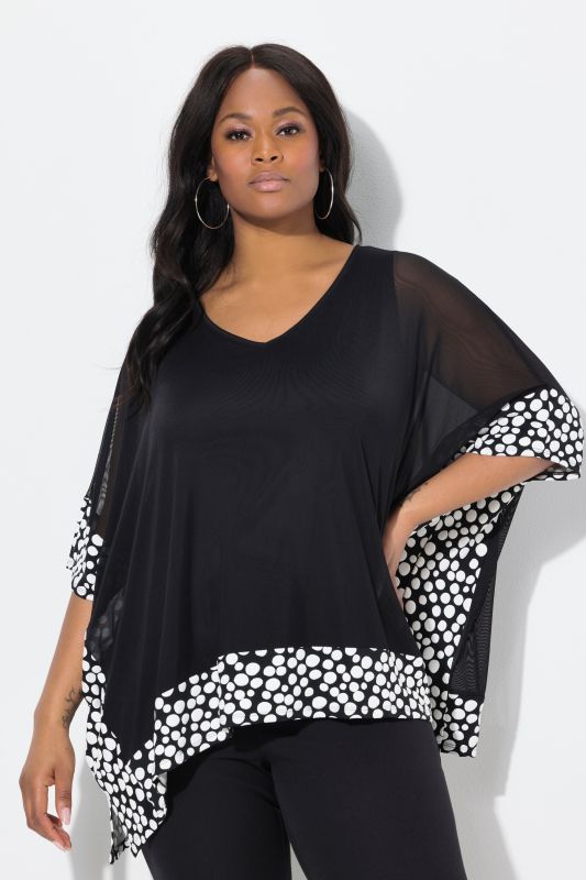 Blouse en mousseline, pois floqués. Col en V et manches 3/4