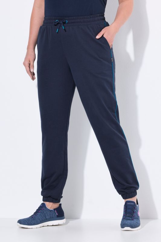 Pantalon de jogging, taille et bas de jambe élastiques, passepoil sur les côtés